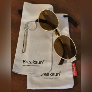 Elegant Gold Oval Sunglasses